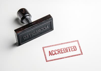 Stempel mit der Aufschrift "Accredited"